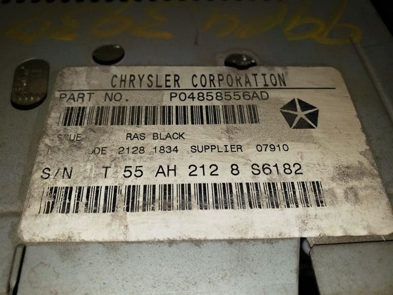 1999 DODGE RAM1500 AM/FM CASSETTE RADIO. PART NUMBER 04858556AD