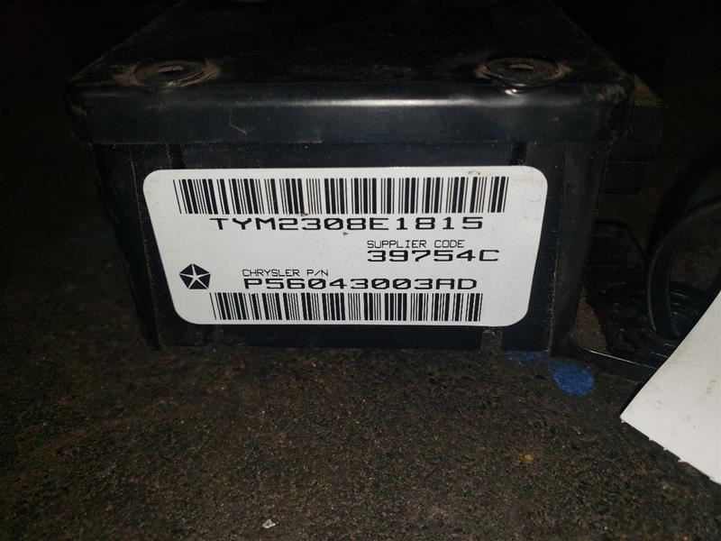 1999 DODGE RAM2500 SEAT BELT TIMING MODULE. PART NUMBER 56043003AD