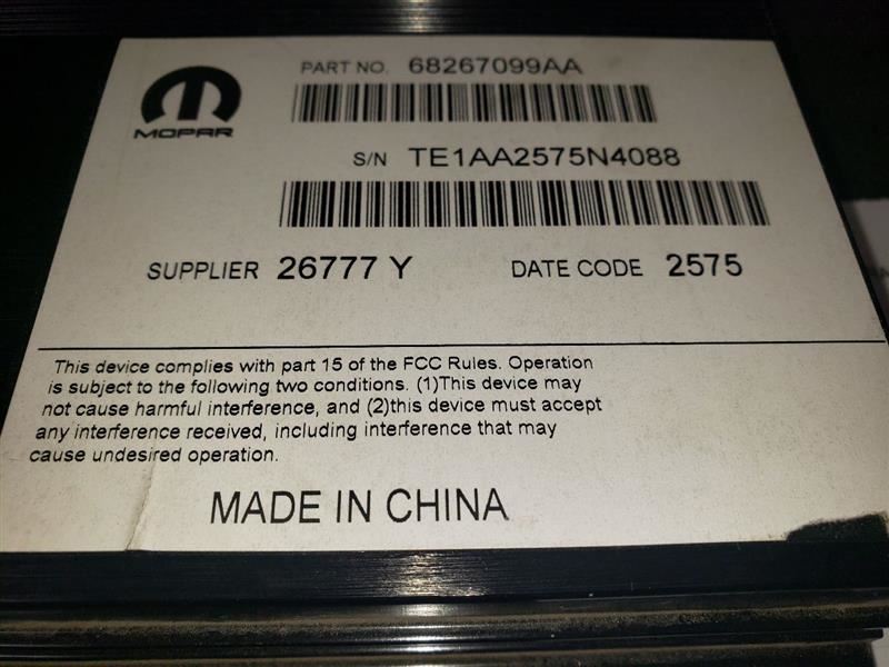 2016 RAM1500 RADIO AMPLIFIER. PART NUMBER 68267099AA