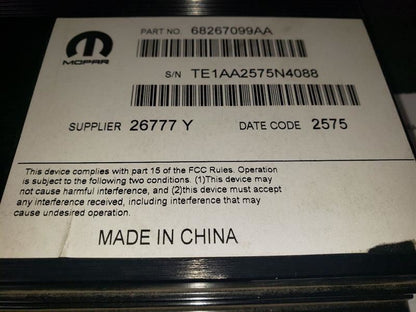 2016 RAM1500 RADIO AMPLIFIER. PART NUMBER 68267099AA