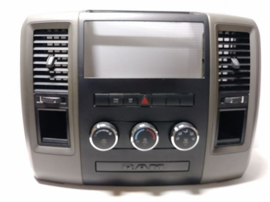 2010 DODGE RAM1500 RADIO BEZEL. TRIM CODE V3. PART NUMBER 1EA951J8AC
