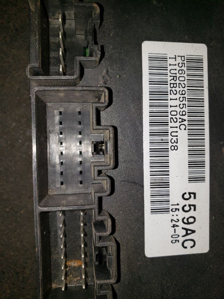 2011 RAM1500 TRANSFER CASE CONTROL MODULE. PART NUMBER 56029559AC
