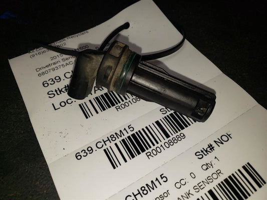 2015 DODGE RAM1500 CRANKSHAFT POSITION SENSOR. PART NUMBER 68079375AC