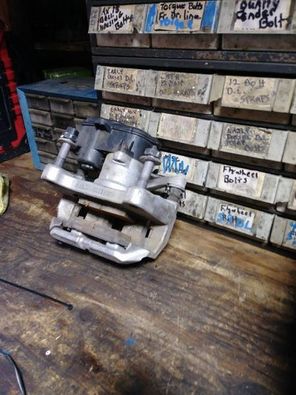 2019 RAM (NEW BODY STYLE) PASSENGER REAR BRAKE CALIPER. PART NUMBER 68412368AB