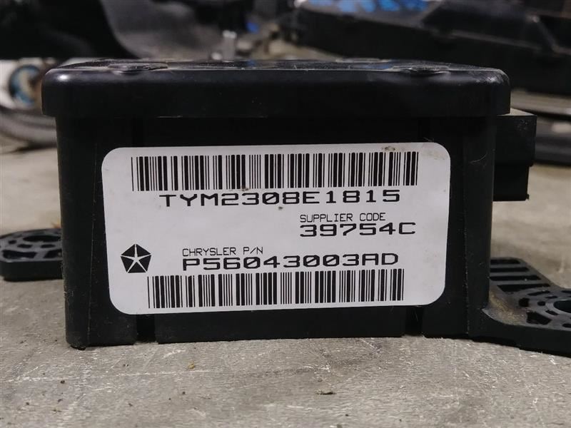 1999 DODGE RAM2500 SEAT BELT TIMING MODULE. PART NUMBER 56043003AD