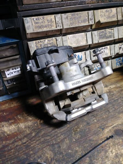 2019 RAM (NEW BODY STYLE) PASSENGER REAR BRAKE CALIPER. PART NUMBER 68412368AB